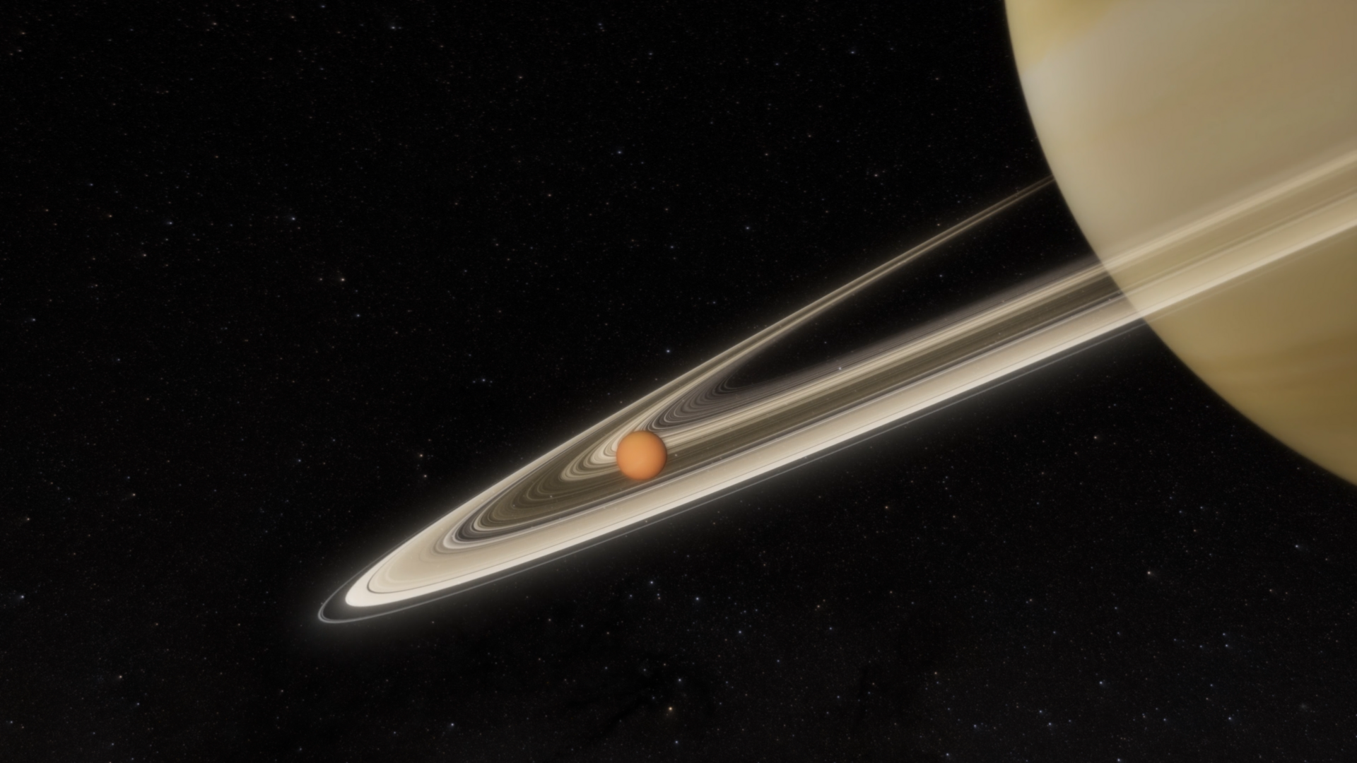 Disco anaranjado de Titán envuelto en su atmósfera densa fotografiado desde una sonda en órbita
